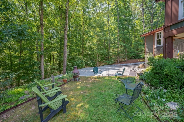 85 Red Bird Rd, Tryon, NC 28782 - view of grassy yard with a forest view