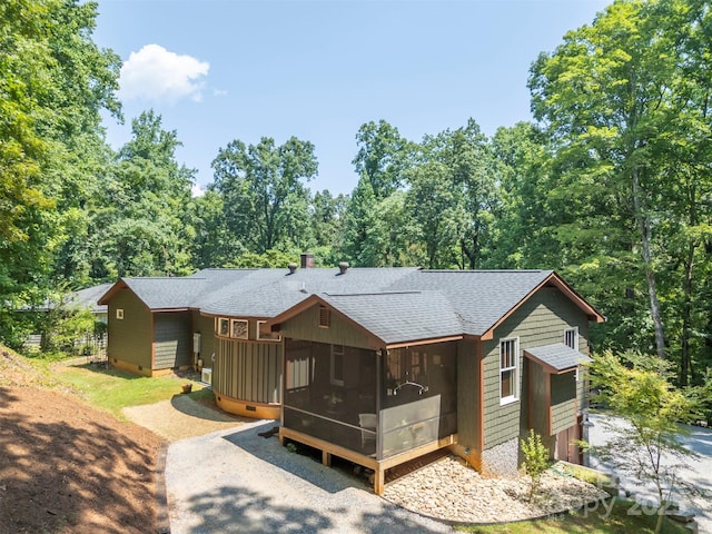 85 Red Bird Rd, Tryon, NC 28782 - view of front of home with a sunroom and a shingled roof