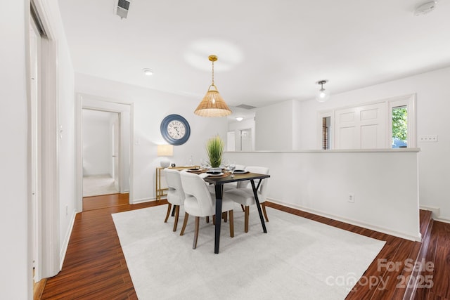 8806 Golf Ridge Dr, Charlotte, NC 28277 - dining space featuring dark wood-style floors and baseboards