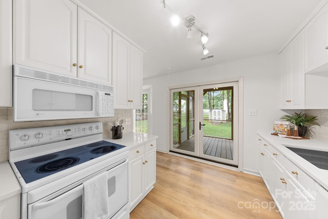 8806 Golf Ridge Dr, Charlotte, NC 28277 - kitchen featuring white appliances and white cabinetry