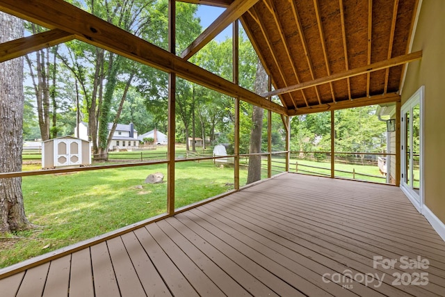 8806 Golf Ridge Dr, Charlotte, NC 28277 - unfurnished sunroom featuring vaulted ceiling and view of wooded area