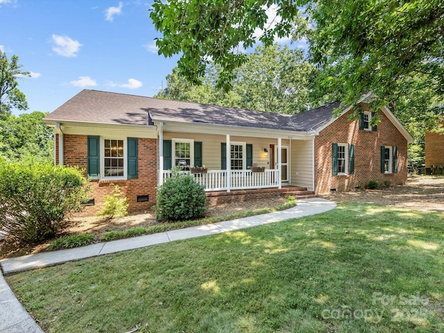 4601 Bournewood Ln, Charlotte, NC 28226 - single story home featuring covered porch, crawl space, brick siding, and a front lawn