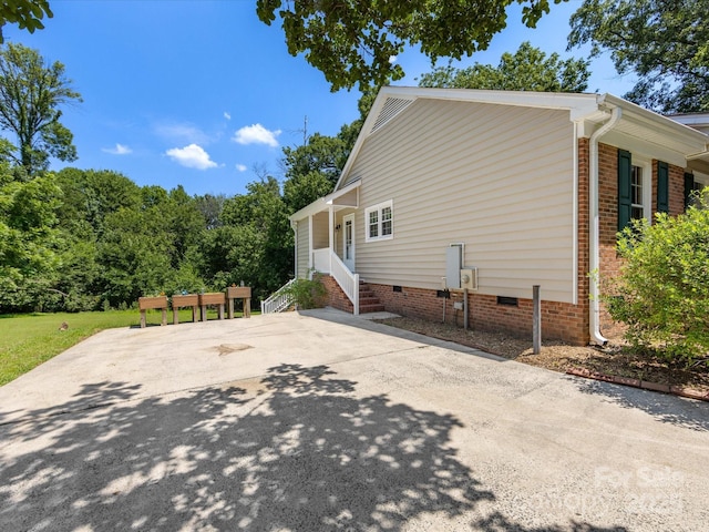 4601 Bournewood Ln, Charlotte, NC 28226 - view of property exterior with crawl space and entry steps