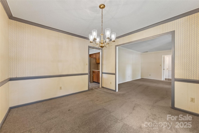 4601 Bournewood Ln, Charlotte, NC 28226 - empty room featuring crown molding, wallpapered walls, a chandelier, and carpet floors