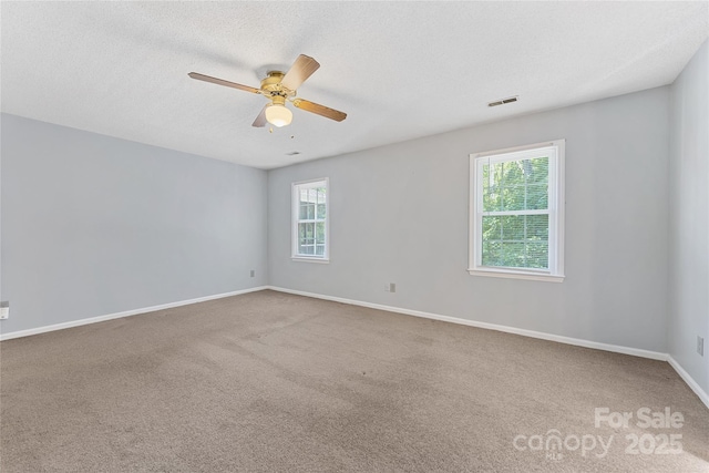 4601 Bournewood Ln, Charlotte, NC 28226 - carpeted empty room featuring ceiling fan and a textured ceiling