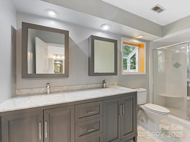 4601 Bournewood Ln, Charlotte, NC 28226 - bathroom with double vanity, a stall shower, and recessed lighting
