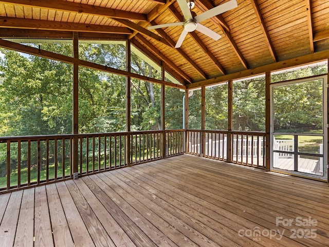 4601 Bournewood Ln, Charlotte, NC 28226 - unfurnished sunroom with a ceiling fan, vaulted ceiling, view of wooded area, and healthy amount of natural light