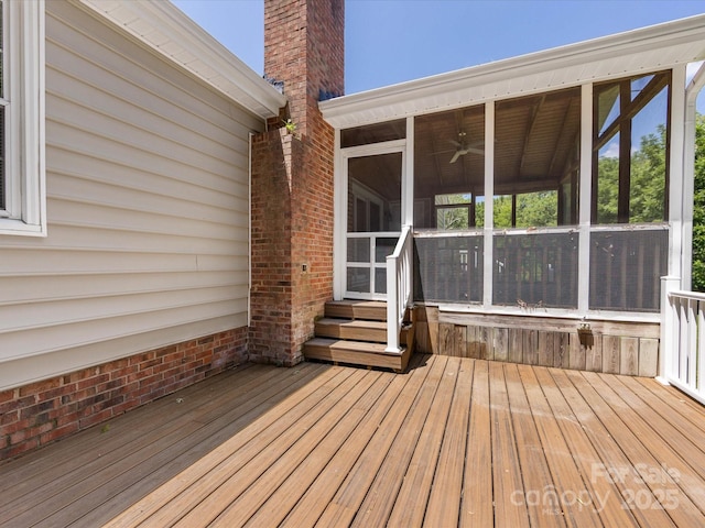 4601 Bournewood Ln, Charlotte, NC 28226 - wooden deck featuring a sunroom and entry steps