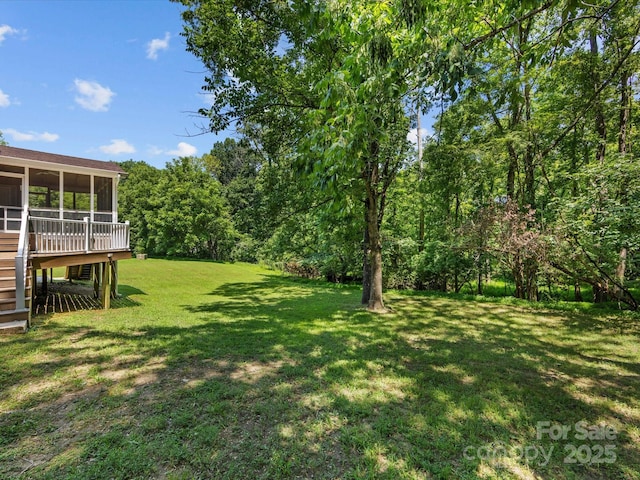 4601 Bournewood Ln, Charlotte, NC 28226 - view of green lawn with a sunroom and stairway