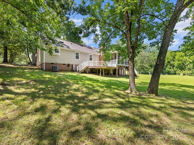 4601 Bournewood Ln, Charlotte, NC 28226 - rear view of house with stairway, a sunroom, crawl space, a yard, and a deck