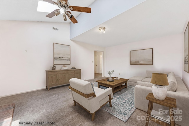 4601 Bournewood Ln, Charlotte, NC 28226 - living area with a ceiling fan, light carpet, and high vaulted ceiling