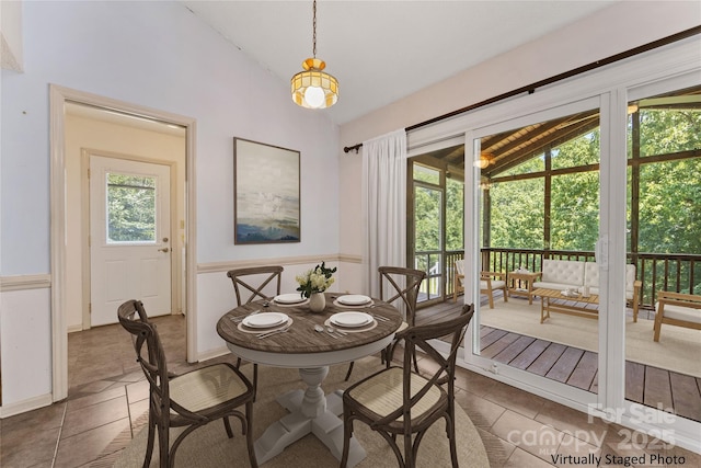 4601 Bournewood Ln, Charlotte, NC 28226 - tiled dining area featuring lofted ceiling