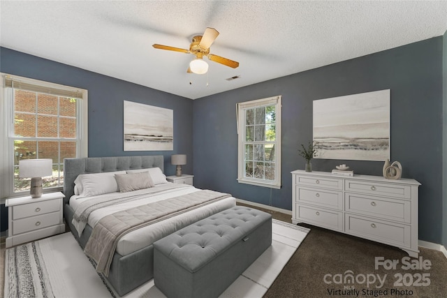 4601 Bournewood Ln, Charlotte, NC 28226 - bedroom featuring carpet flooring, a ceiling fan, and a textured ceiling