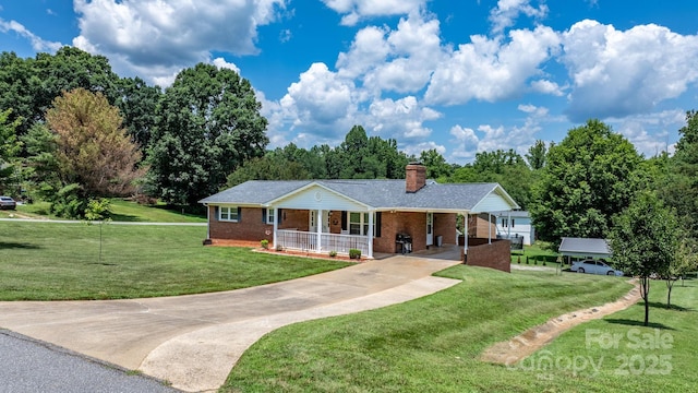 100 Pinecrest Ct, Taylorsville, NC 28681 - ranch-style home featuring concrete driveway, a porch, brick siding, a front lawn, and a chimney