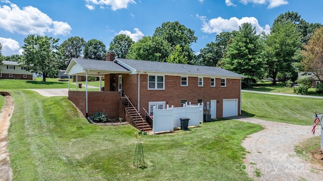 100 Pinecrest Ct, Taylorsville, NC 28681 - back of house with driveway, a garage, stairs, a yard, and a chimney