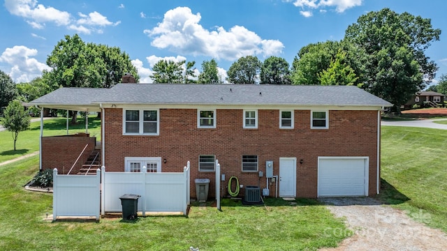 100 Pinecrest Ct, Taylorsville, NC 28681 - view of front of home featuring gravel driveway, a chimney, an attached garage, and brick siding
