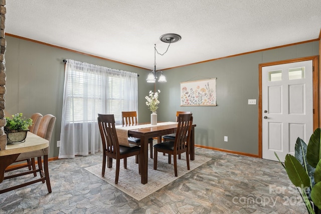 100 Pinecrest Ct, Taylorsville, NC 28681 - dining space featuring stone finish floors, crown molding, and a textured ceiling