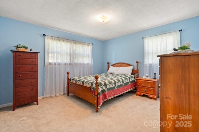 100 Pinecrest Ct, Taylorsville, NC 28681 - carpeted bedroom featuring multiple windows