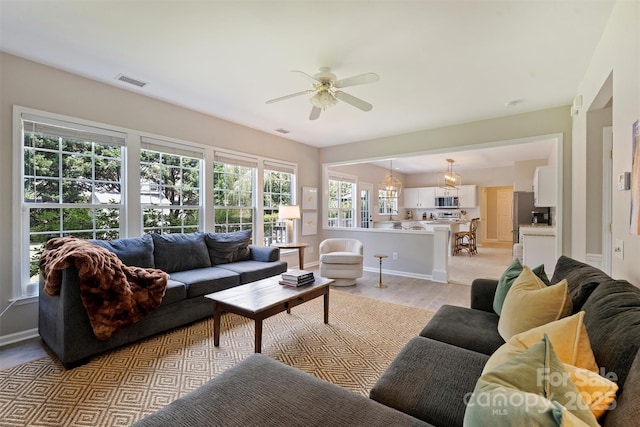 7930 Lancken Dr, Charlotte, NC 28277 - living room with ceiling fan and light wood-style flooring