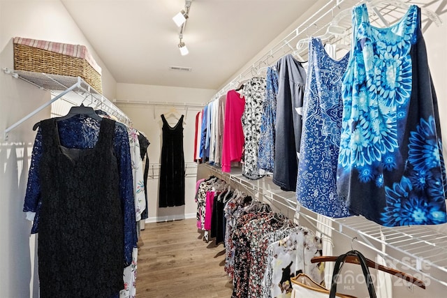 7930 Lancken Dr, Charlotte, NC 28277 - walk in closet with wood finished floors