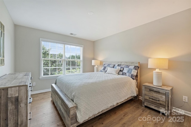 7930 Lancken Dr, Charlotte, NC 28277 - bedroom featuring wood finished floors and baseboards