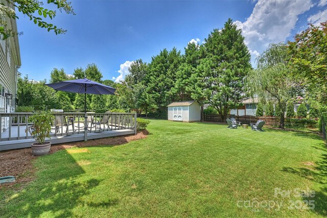 7930 Lancken Dr, Charlotte, NC 28277 - view of yard featuring a storage shed and a wooden deck