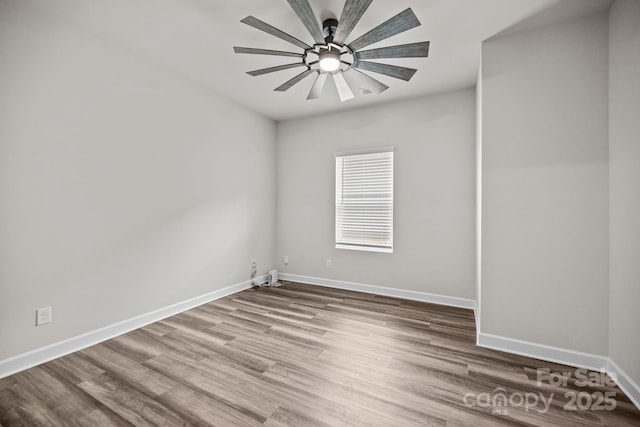 4502 Bright Rd, Charlotte, NC 28214 - unfurnished room featuring wood finished floors and a ceiling fan