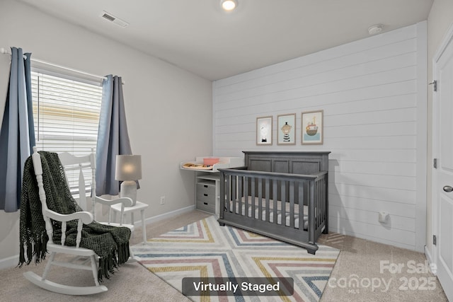 4502 Bright Rd, Charlotte, NC 28214 - carpeted bedroom featuring wooden walls and baseboards