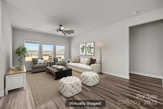 4502 Bright Rd, Charlotte, NC 28214 - living room with ceiling fan and wood finished floors