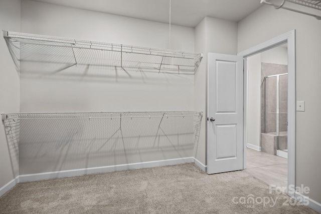 4502 Bright Rd, Charlotte, NC 28214 - walk in closet featuring carpet floors