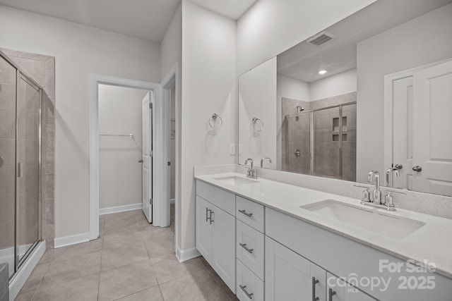4502 Bright Rd, Charlotte, NC 28214 - full bathroom with a shower stall, double vanity, and recessed lighting