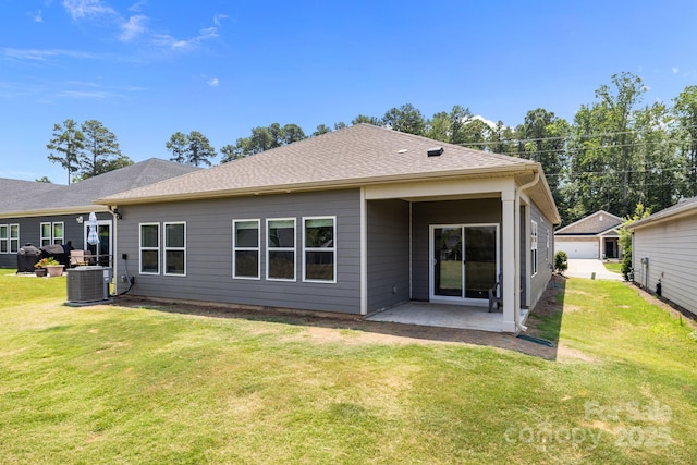 4502 Bright Rd, Charlotte, NC 28214 - rear view of house with a patio area and a lawn