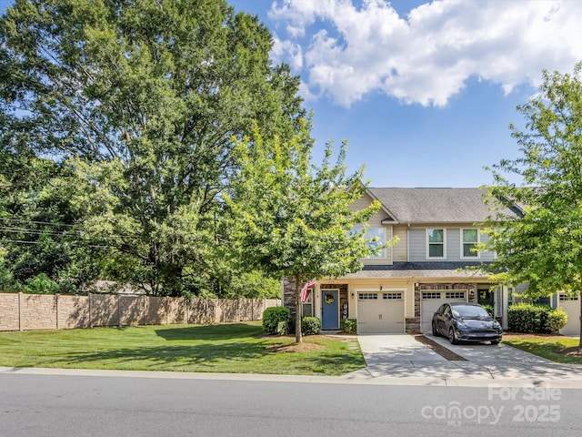510 Park Meadows Dr, Matthews, NC 28104 - view of front of property with concrete driveway, a garage, and stone siding