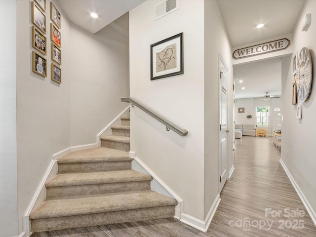 510 Park Meadows Dr, Matthews, NC 28104 - staircase with ceiling fan, wood finished floors, and recessed lighting
