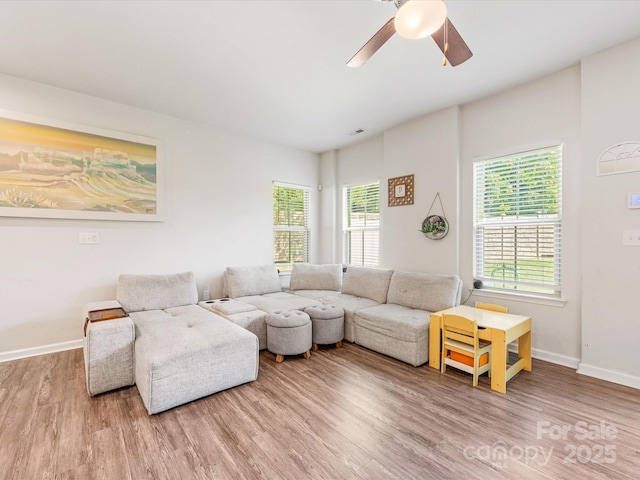 510 Park Meadows Dr, Matthews, NC 28104 - living room featuring wood finished floors and ceiling fan
