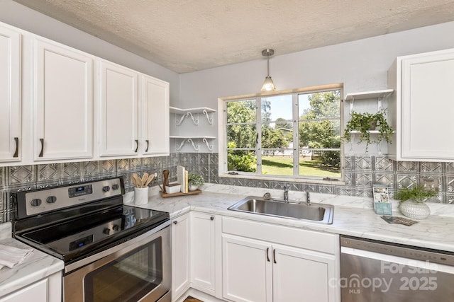 39 Nix Rd, Hendersonville, NC 28792 - kitchen with appliances with stainless steel finishes, open shelves, white cabinets, decorative backsplash, and a textured ceiling