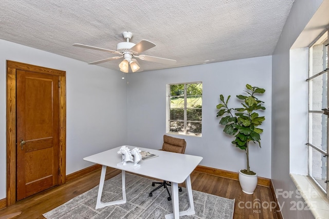 39 Nix Rd, Hendersonville, NC 28792 - home office with wood finished floors, a textured ceiling, and ceiling fan