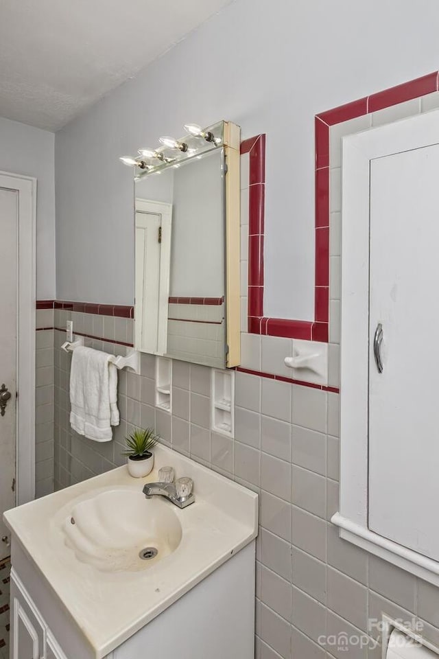 39 Nix Rd, Hendersonville, NC 28792 - bathroom with vanity and tile walls