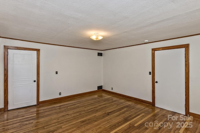 39 Nix Rd, Hendersonville, NC 28792 - basement featuring wood finished floors, a textured ceiling, and crown molding