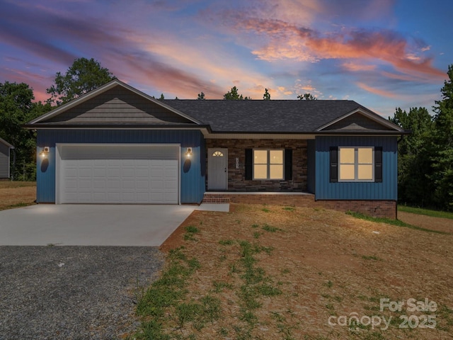 205 S Hill Ave, Albemarle, NC 28001 - ranch-style house with concrete driveway, a garage, and a porch