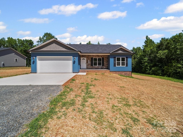 205 S Hill Ave, Albemarle, NC 28001 - single story home featuring concrete driveway, a garage, a front lawn, and stone siding