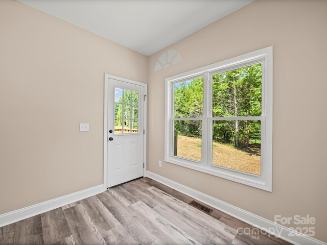 205 S Hill Ave, Albemarle, NC 28001 - doorway to outside featuring wood finished floors