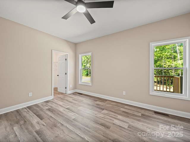 205 S Hill Ave, Albemarle, NC 28001 - empty room with ceiling fan and wood finished floors