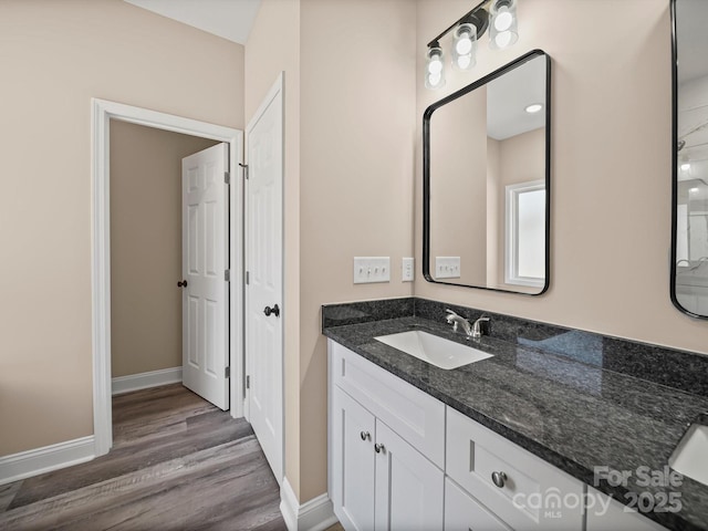 205 S Hill Ave, Albemarle, NC 28001 - bathroom featuring vanity and wood finished floors