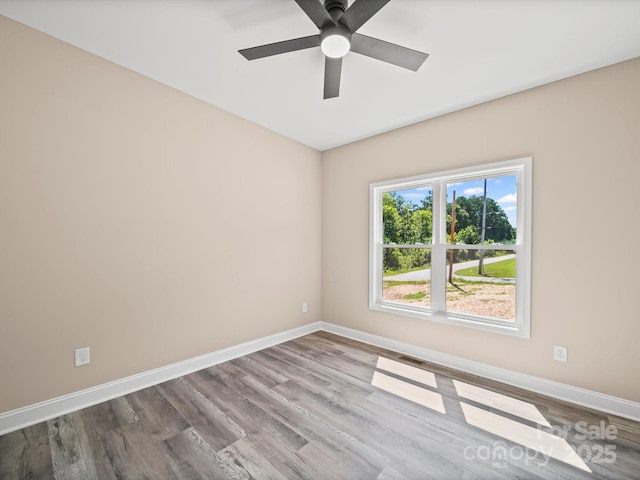 205 S Hill Ave, Albemarle, NC 28001 - spare room featuring a ceiling fan and wood finished floors