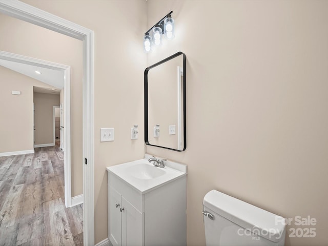 205 S Hill Ave, Albemarle, NC 28001 - half bath with vanity and wood finished floors