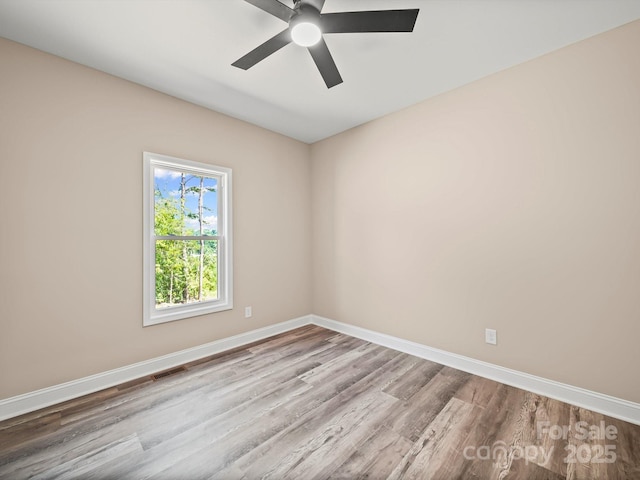 205 S Hill Ave, Albemarle, NC 28001 - empty room featuring wood finished floors and a ceiling fan