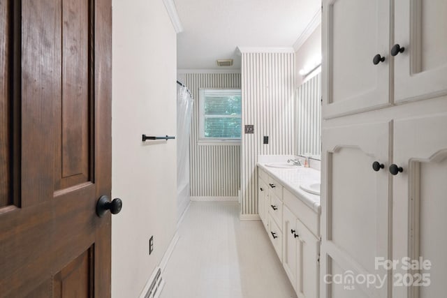10120 Withers Rd, Charlotte, NC 28278 - bathroom featuring crown molding, double vanity, and shower / bath combo