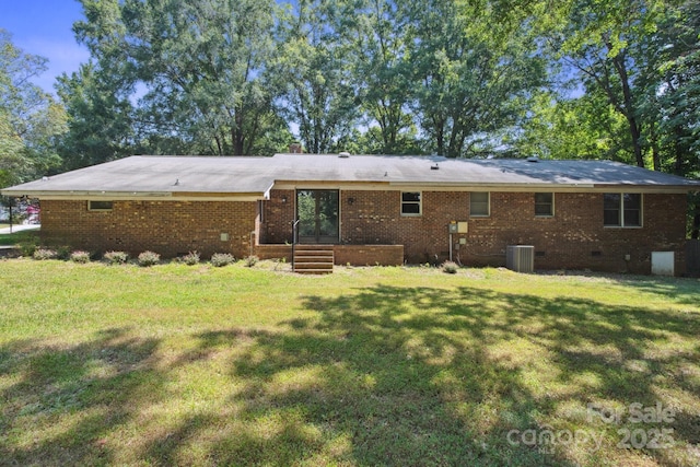 10120 Withers Rd, Charlotte, NC 28278 - rear view of property featuring a lawn, brick siding, french doors, and crawl space