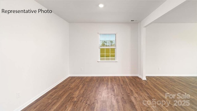 9223 Poquoson Dr, Gastonia, NC 28056 - spare room with wood finished floors and recessed lighting